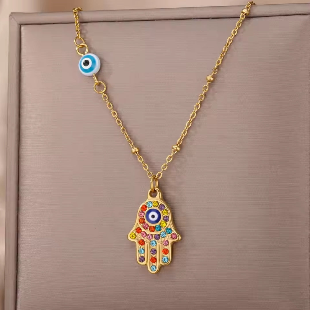 Kleurrijke goudkleurige ketting met figuurtje