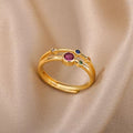 Kleurrijke gesmede goudkleurige ring met stenen