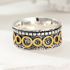 Retro ring met meerdere cirkels in koper- en zilverkleur