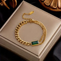 Gold-Tone Double Chain Bracelet with Green Baguette Stone