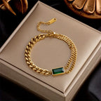 Gold-Tone Double Chain Bracelet with Green Baguette Stone