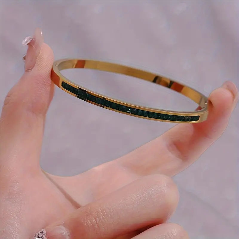 Gold-Tone Bangle with Green Stone Accents
