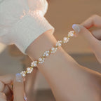 Adjustable Gold-Plated Pearl Bead Bracelet with Cat Paw