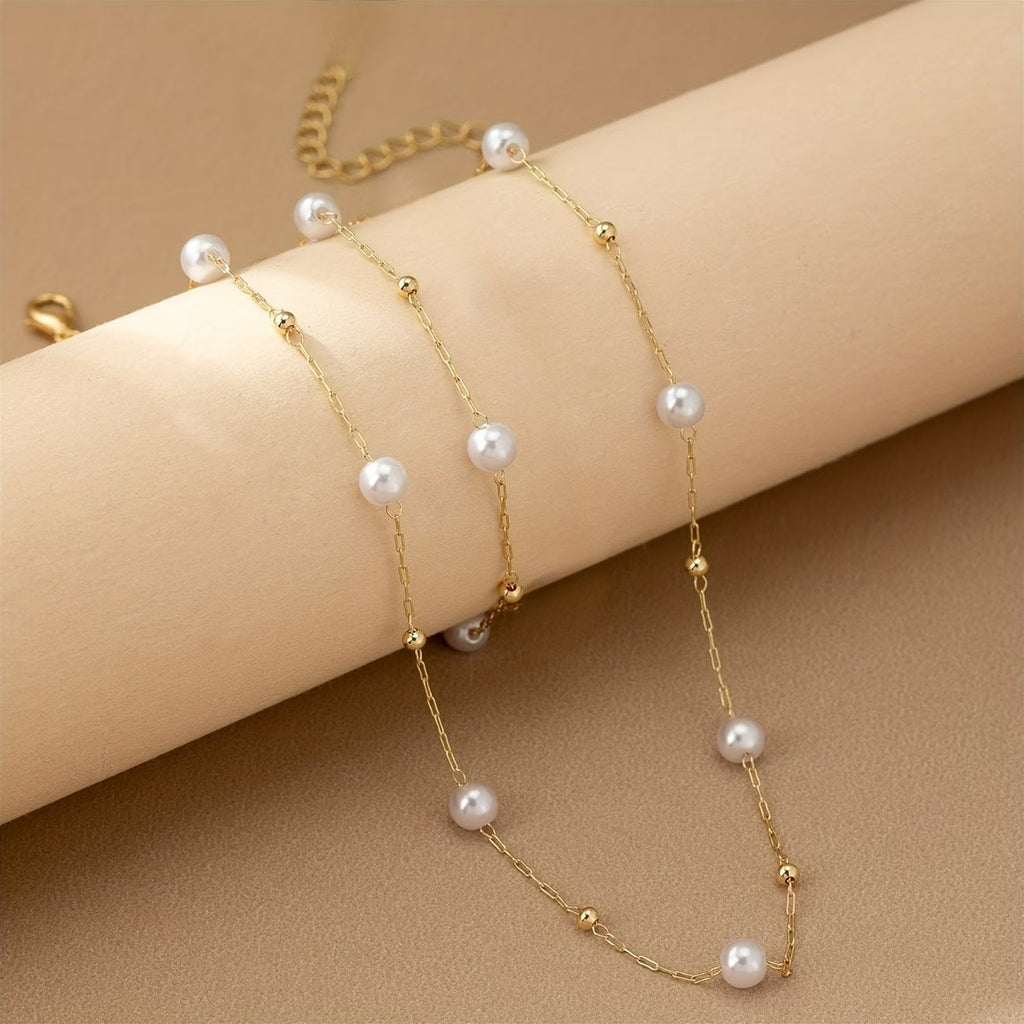 Fijne sieradenset met parelketting