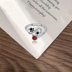 Adjustable Black Paw Print Ring with Red Stone
