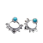 Verzilverde mandala-oorknopjes met turquoise