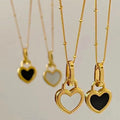 Black and White Heart Pendant Necklace in Gold Tone
