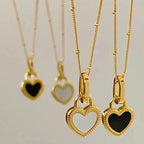Black and White Heart Pendant Necklace in Gold Tone