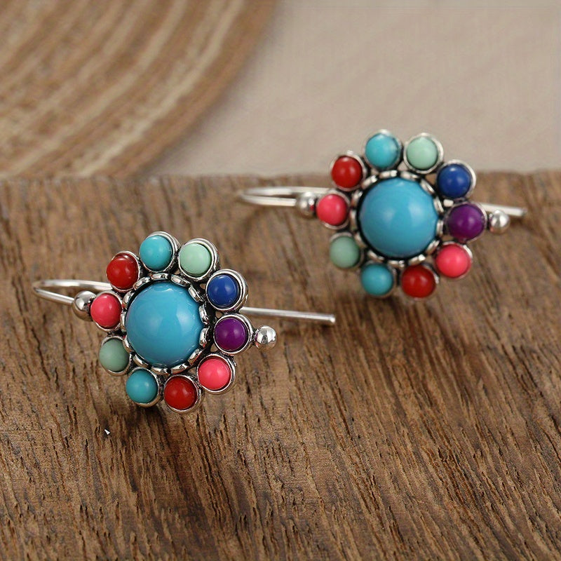 Bloemenoorhangers met turkoois en koraallook