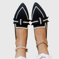 Platte loafers met knoopdetail en makkelijke instap