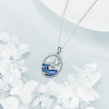 Zilverkleurige ketting met hanger met oceaangolf en meeuw