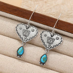 Ambachtelijke boho oorbellen met turquoise hart en vlinder