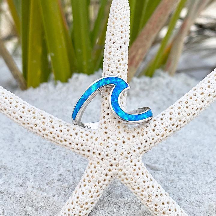 Ring met zeegolf in opaallook en zilverkleur