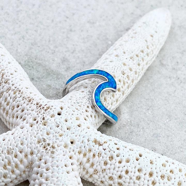Ring met zeegolf in opaallook en zilverkleur