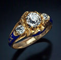 Antik guldfarvet ring i vintagestil med blå zirkonia