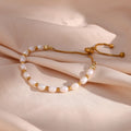 Pearl and Gold-Tone Chain Bracelet with Charm