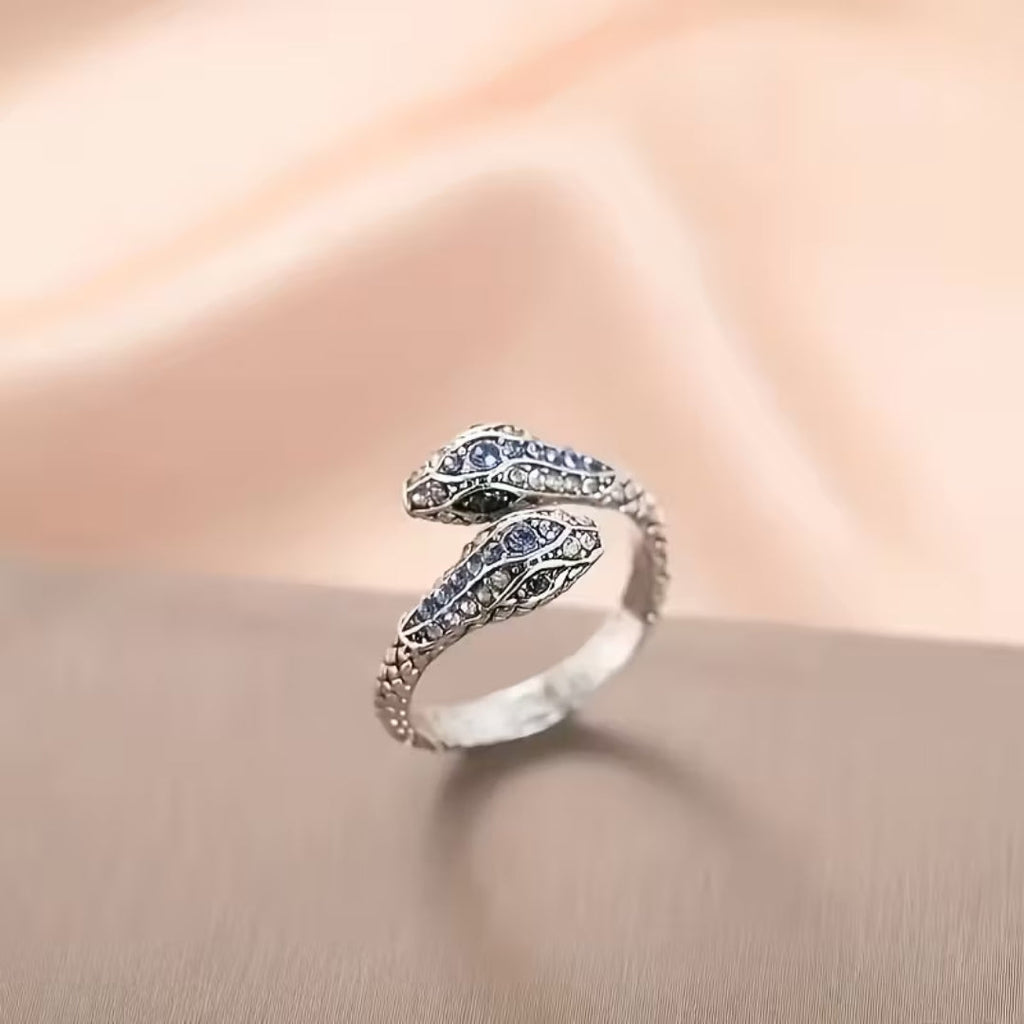 Open slangenring met saffierlook