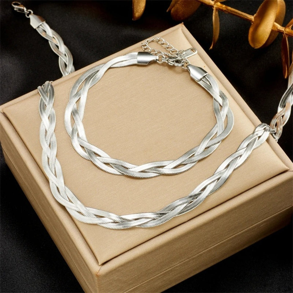 Set met slangenketting en armband in goudkleurig staal
