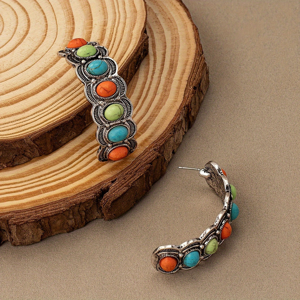 Zilverkleurige turquoise oorringen in southwesternstijl