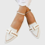 Platte loafers met knoopdetail en makkelijke instap