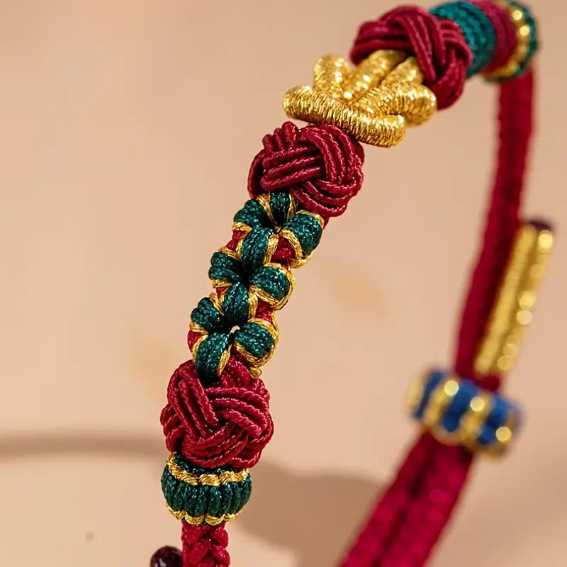 Handwoven Knot Bracelet in Red, Green and Blue Thread