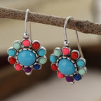 Bloemenoorhangers met turkoois en koraallook