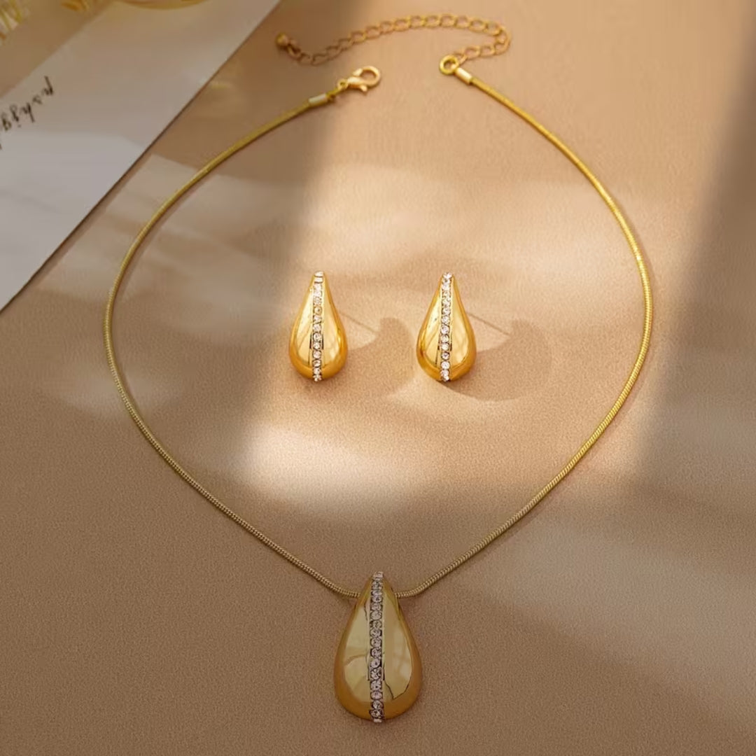Goudkleurige pavé-sieradenset met druppel