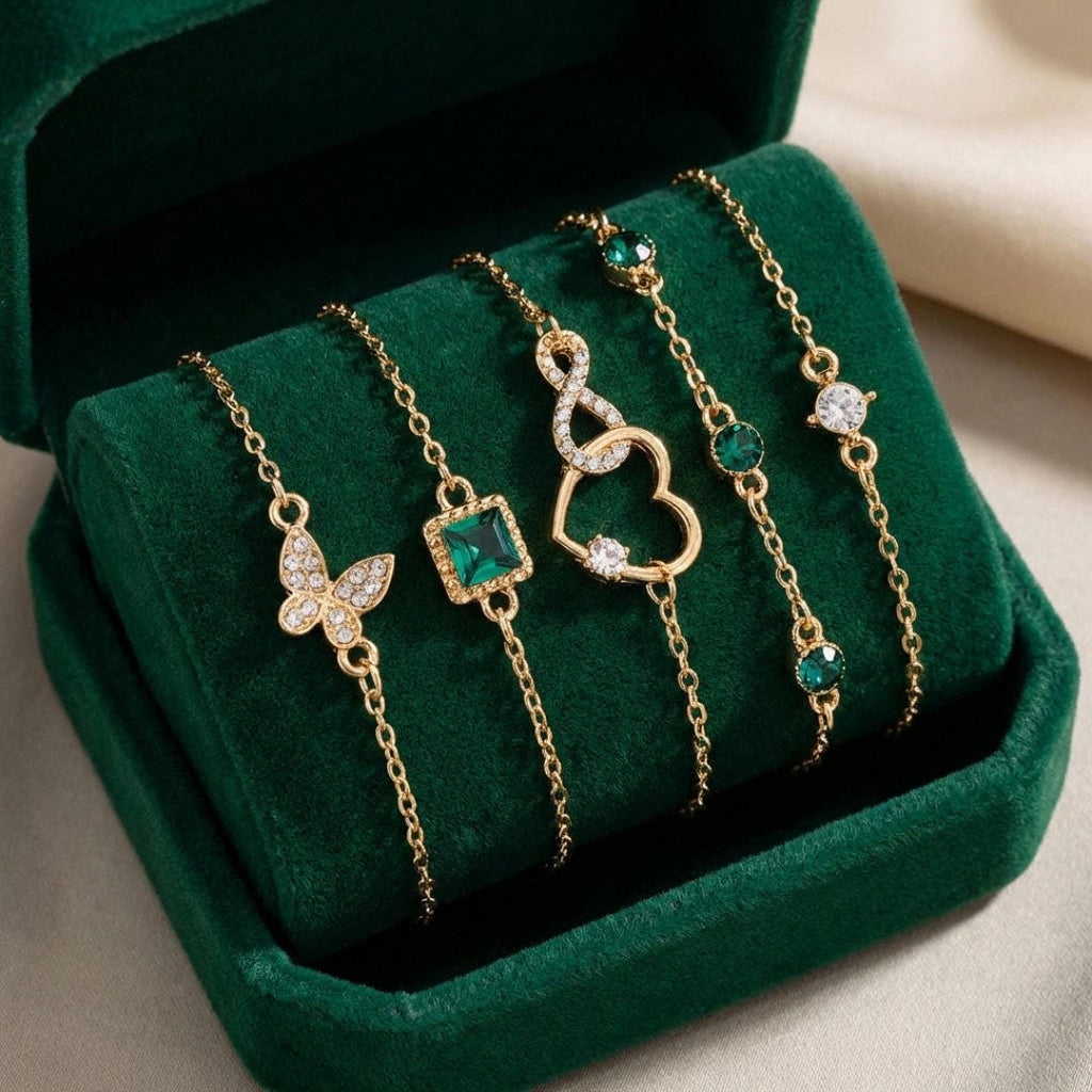 Armbandenset met opengewerkt hart en groen kristal