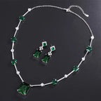 Green Stone Station Necklace and Earrings Set in White Gold Tone
