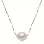 Witgoudkleurige ketting met witte imitatieparel als hanger