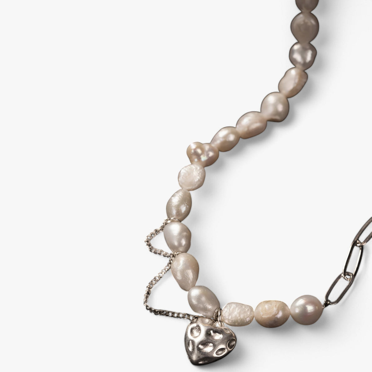 Asymmetric Pearl Necklace with Heart Detail