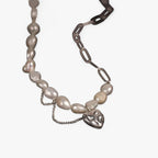 Asymmetric Pearl Necklace with Heart Detail