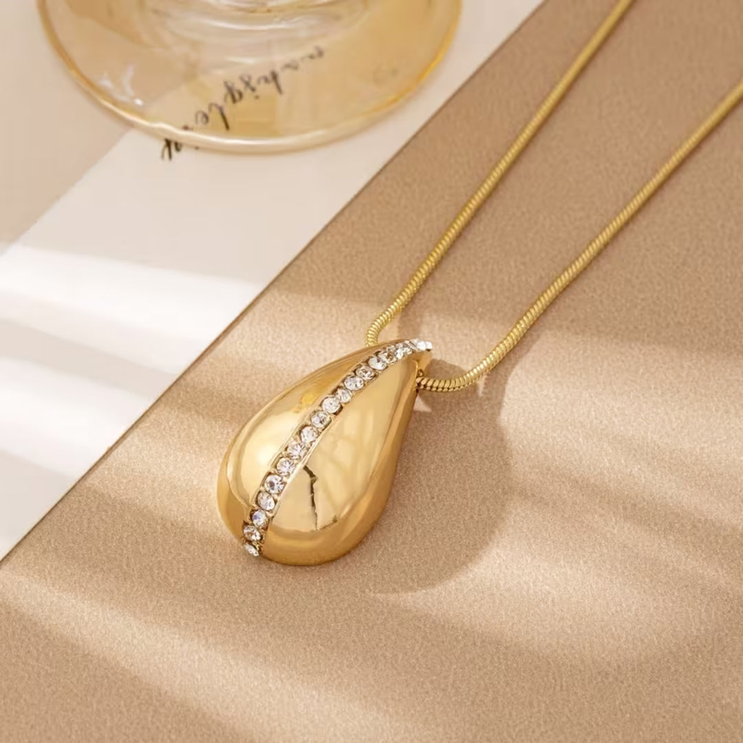 Goudkleurige pavé-sieradenset met druppel