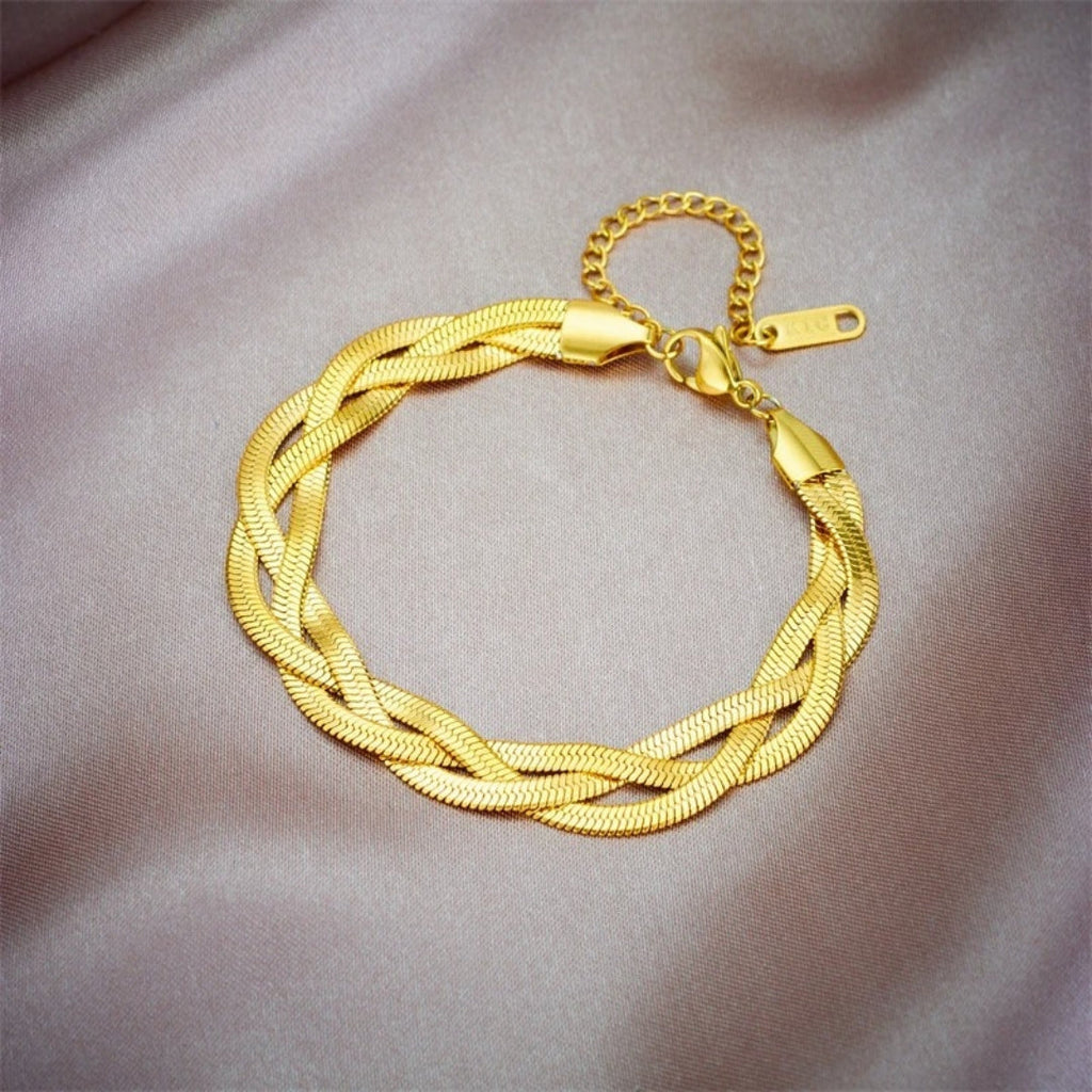 Set met slangenketting en armband in goudkleurig staal