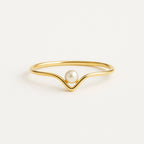Goudkleurige ring met één parel