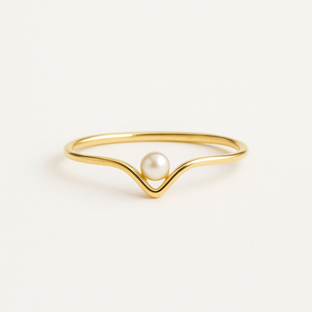 Goudkleurige ring met één parel