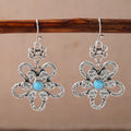 Vintage bohemian bloemoorhangers met turkoois
