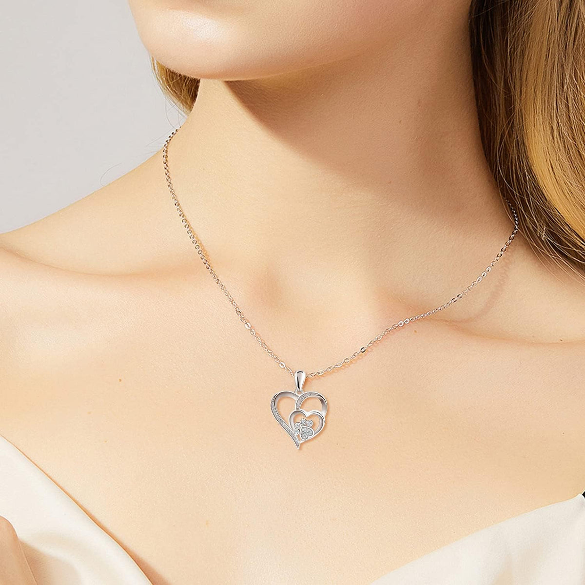 Sterling zilveren ketting met pootje, hart en zirkonia