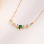 Gold-Tone Necklace with Small Green Stone Accent
