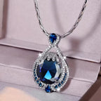 Druppelvormige halo-ketting in drie kleuren