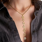 Ketting met zeven stenen en goudkleurige hanger