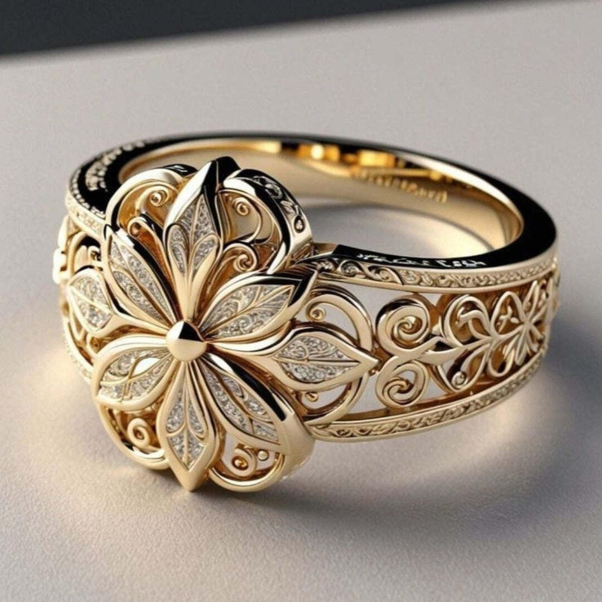 Goudkleurige bloemring met kristal in het midden en krullende band