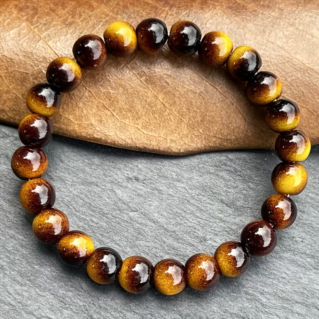 Kralenarmband met stenen in granaatlook