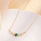Gold-Tone Necklace with Small Green Stone Accent