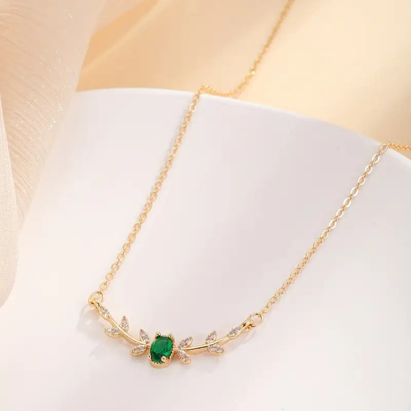 Gold-Tone Necklace with Small Green Stone Accent