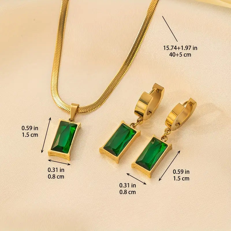 Set met slangenketting en oorbellen met groene steen in goudkleur