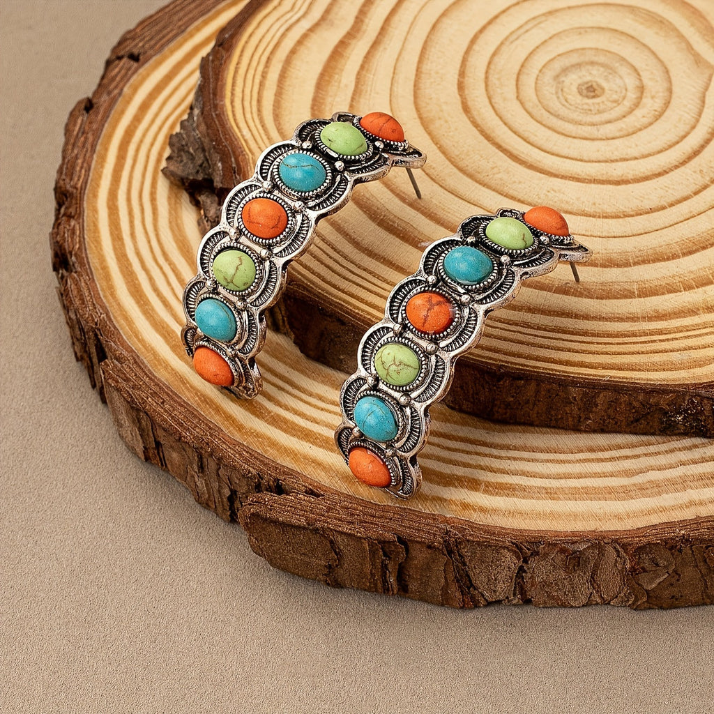 Zilverkleurige turquoise oorringen in southwesternstijl