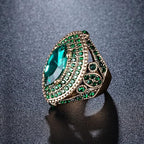 Regent-ring met smaragdlook in goudkleur