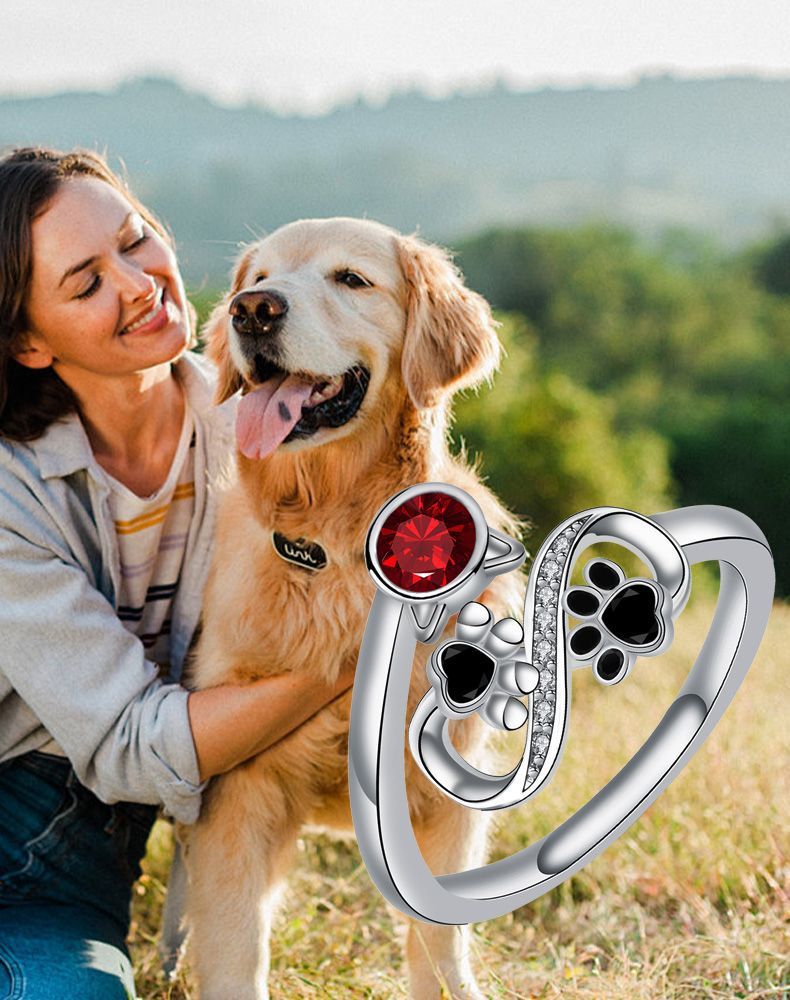 Adjustable Black Paw Print Ring with Red Stone