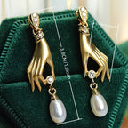 Hand and Pearl Earrings